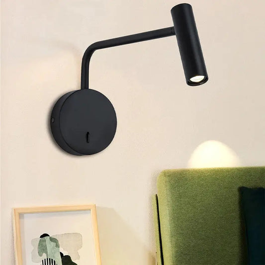 Black matte wall lights with curved arm and adjustable head ideal for bedroom reading in modern decorbites gold led style