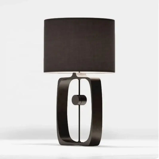 Modern matte black metal table lamp with cylindrical fabric shade for living room decor by decorbites designer