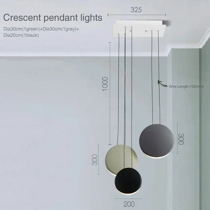 Modern matte black and muted green decorbites crescent moon chandelier with sleek circular shades for dining room decor