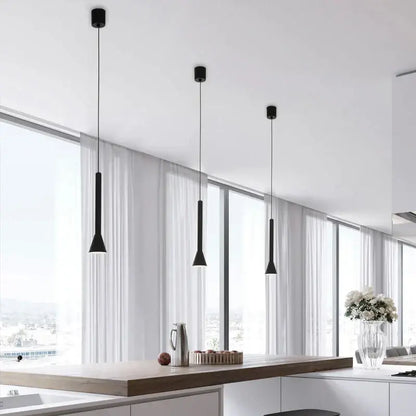 Three sleek black matte nordic pendant lamps with minimalist cylindrical design for living room or staircase lighting