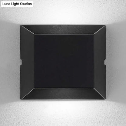 Modern matte black rectangular led wall sconce with angular design and matte finish for balcony outdoor lighting