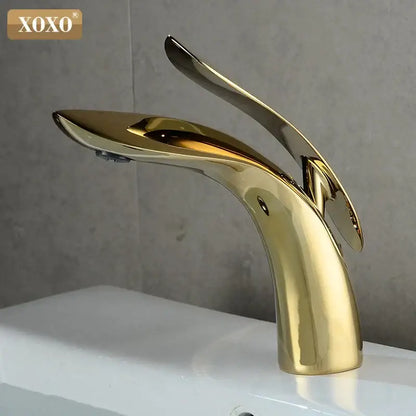Gold-colored sleek and modern decorbites single handle basin faucet with curved spout for bathroom use