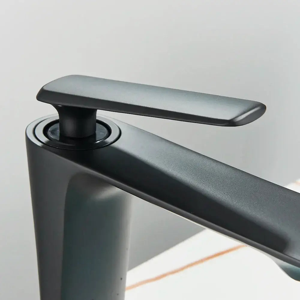 Modern matte black tall basin brass faucet with sleek minimalist design and smooth rounded edges for bathroom sink decorbites black tall