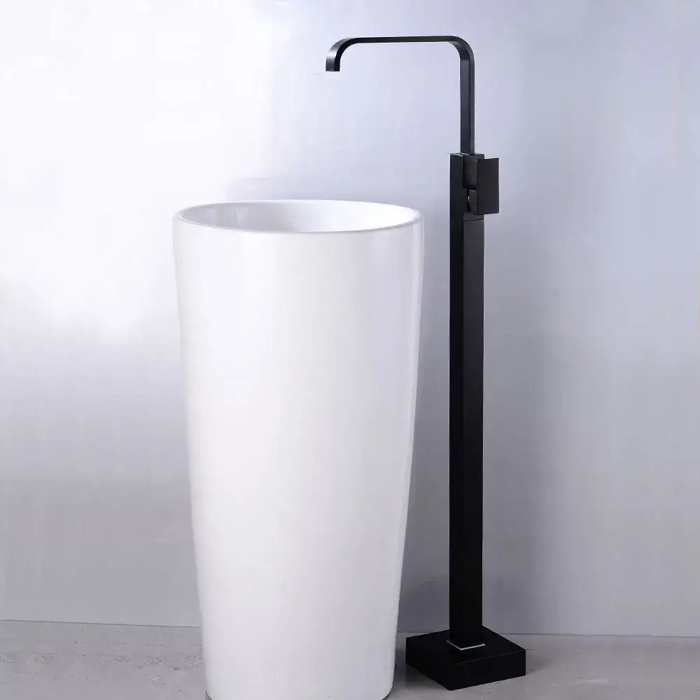 Modern matte black tall basin faucet on white ceramic pedestal sink decorbites black tall bathroom mixer tap