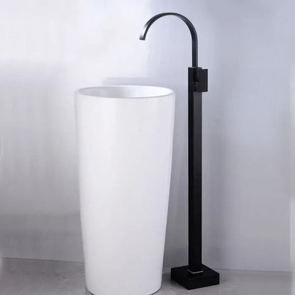 White ceramic pedestal sink with a modern decorbites black tall basin faucet in matte finish for bathroom use