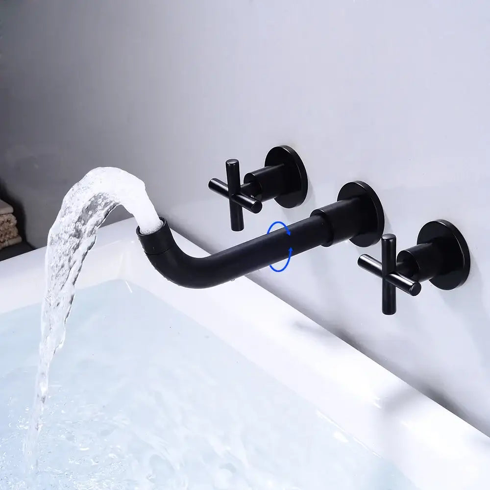 Modern matte black wall mounted dual handle bathroom sink mixer tap with cross handles and curved spout flowing water