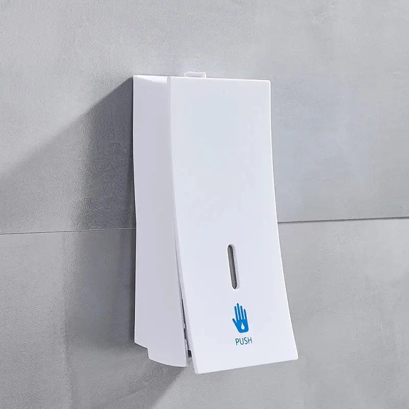 Modern matte black wall-mounted soap dispenser with white push label and blue hand icon decorbites 450ml