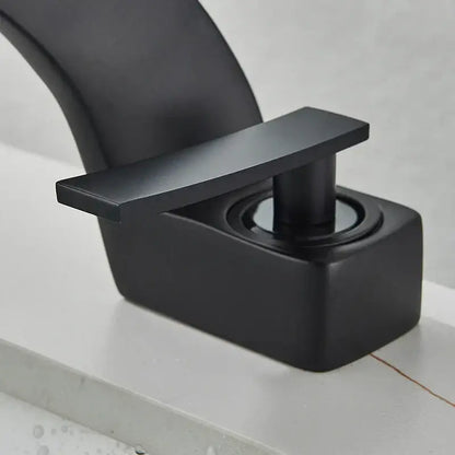 Modern matte black waterfall basin faucet with rectangular handle and square base for black waterfall bathroom decorbites