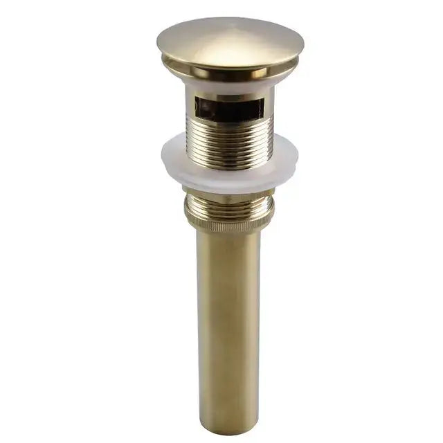 Brass-finished bathroom sink drain with threaded connections paired with modern matte black waterfall basin faucet decorbites brushed gold