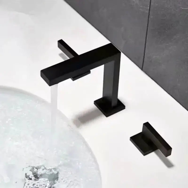 Modern matte black waterfall basin faucet with three square handles and matching separate handle for bathroom decorbites brushed gold