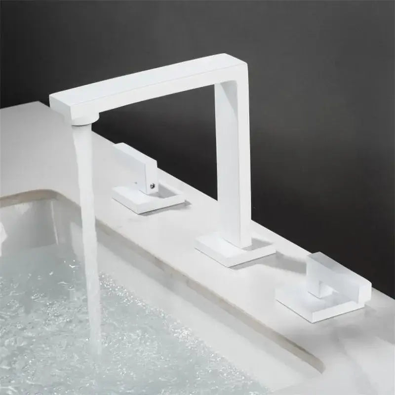 Modern white rectangular basin faucet with three handles and waterfall spout, suitable for decorbites brushed gold decor