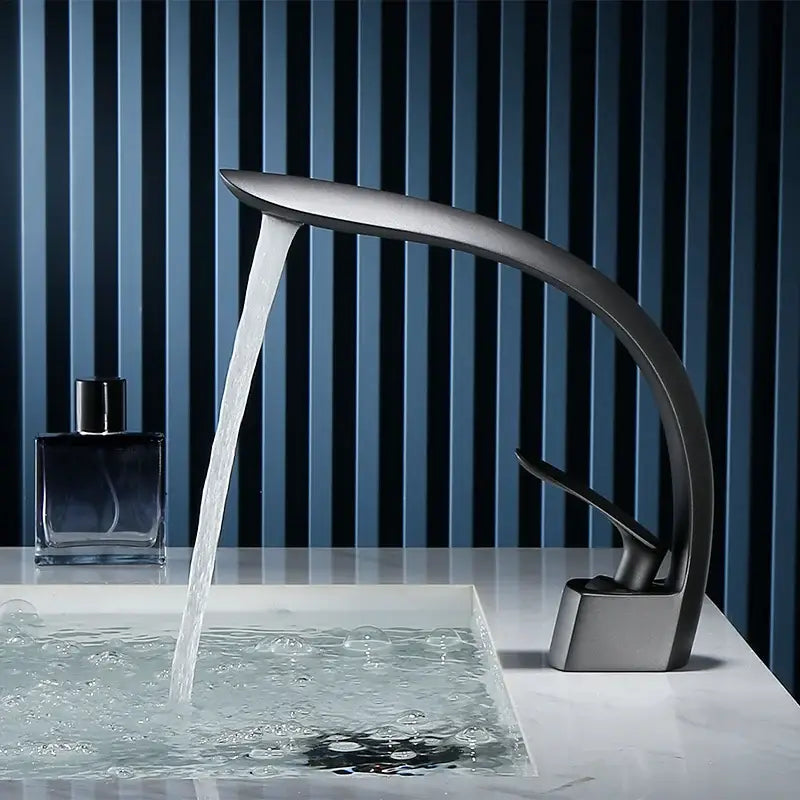 Modern matte black waterfall basin faucet single handle mixer with sleek curved design for bathroom use