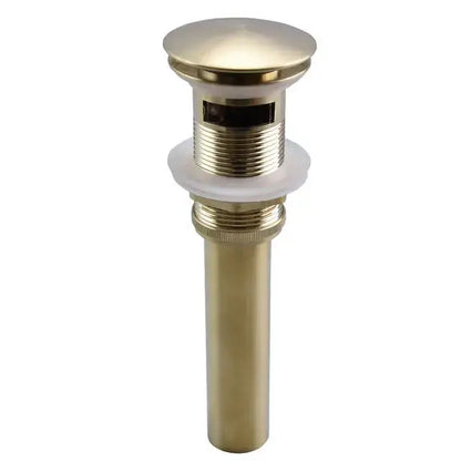 Brass-finished bathroom sink drain with threaded connections paired with modern matte black single handle mixer basin faucet