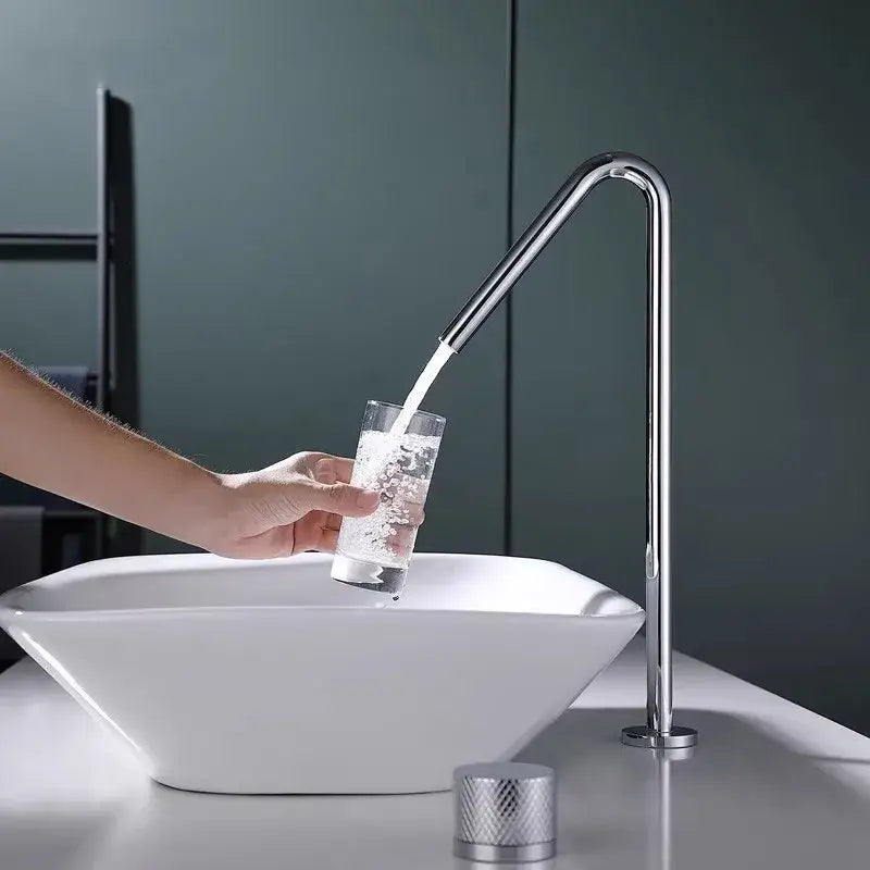 Modern chrome-finished basin faucet with sleek curved spout and cylindrical base for decorbites brushed black basin faucet