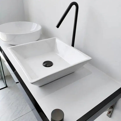 White square ceramic sink with a modern decorbites brushed black basin faucet and matte black drain for bathroom use