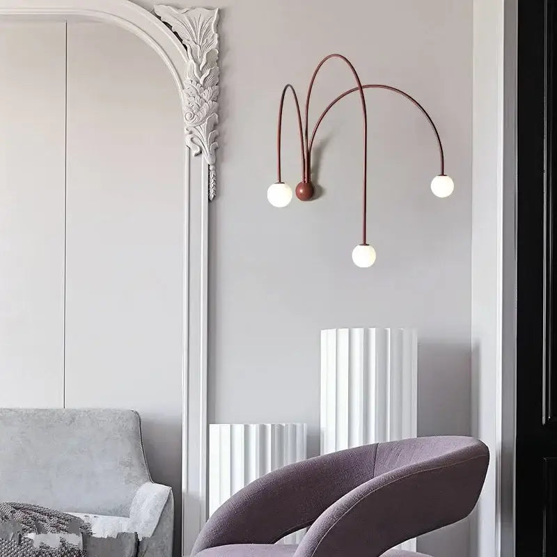 Modern matte copper glass ball wall lamp with three curved arms and white bulbs for living room decorbites glass ball