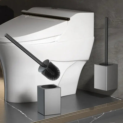 Modern matte gray and black metal toilet brush holder set with dense bristles and sleek brush holder design