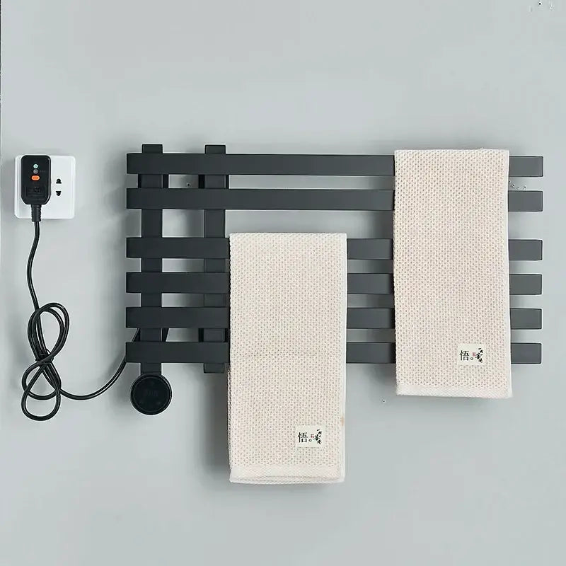 Modern matte gray black metal towel warmer with two off-white textured towels for decorbites digital touch bathroom use