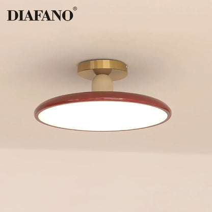 Diafano modern matte white and brass led ceiling light with circular red ceramic shade for living room use
