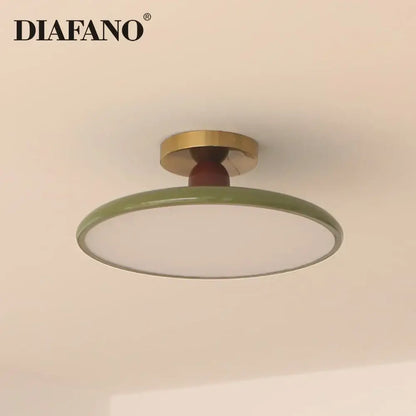 Diafano modern led ceiling light with matte olive green shade and brass mounting hardware for living room use