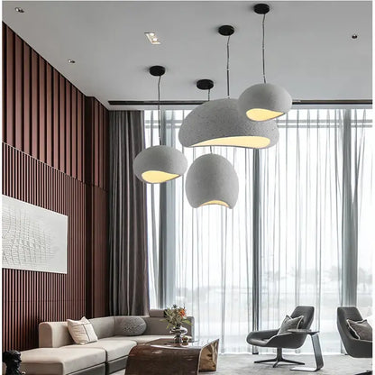 Modern gray concrete pendant lights with matte texture and warm glow for decorbites light industrial bedroom use