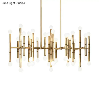 Gold-toned modern metal island light with geometric bamboo-inspired multi-rod design and e12 e14 spherical bulbs