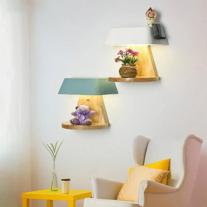 Two modern metal wall sconces with wooden backplates featuring white and teal fabric shades for living room lighting fixtures