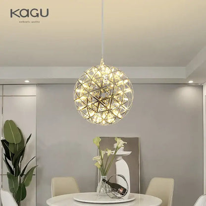 Modern metallic ball fireworks pendant light with gold-toned metal frame and geometric design for living room