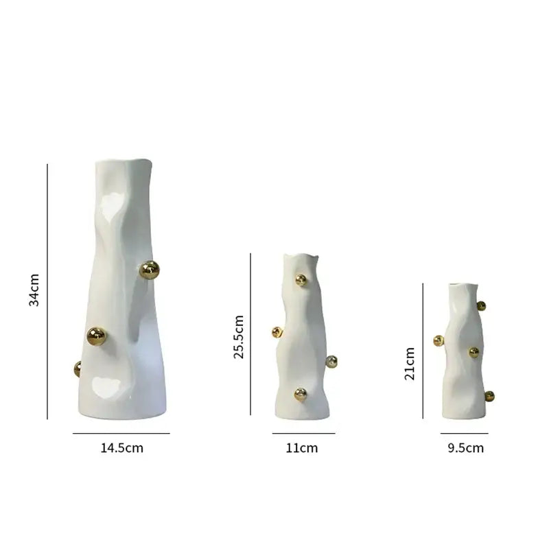 Set of three white ceramic decorbites geometric sphere vases with gold-tone accents for modern living room decor