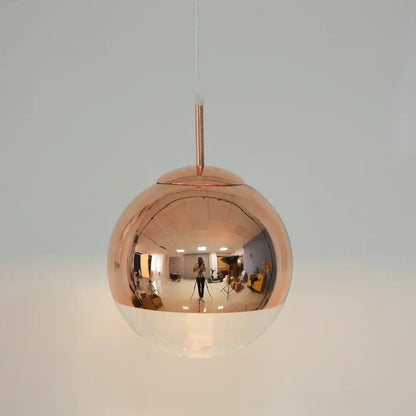 Copper-finished modern metallic glass ball electroplate pendant light with reflective polished surface for kitchen decorbites