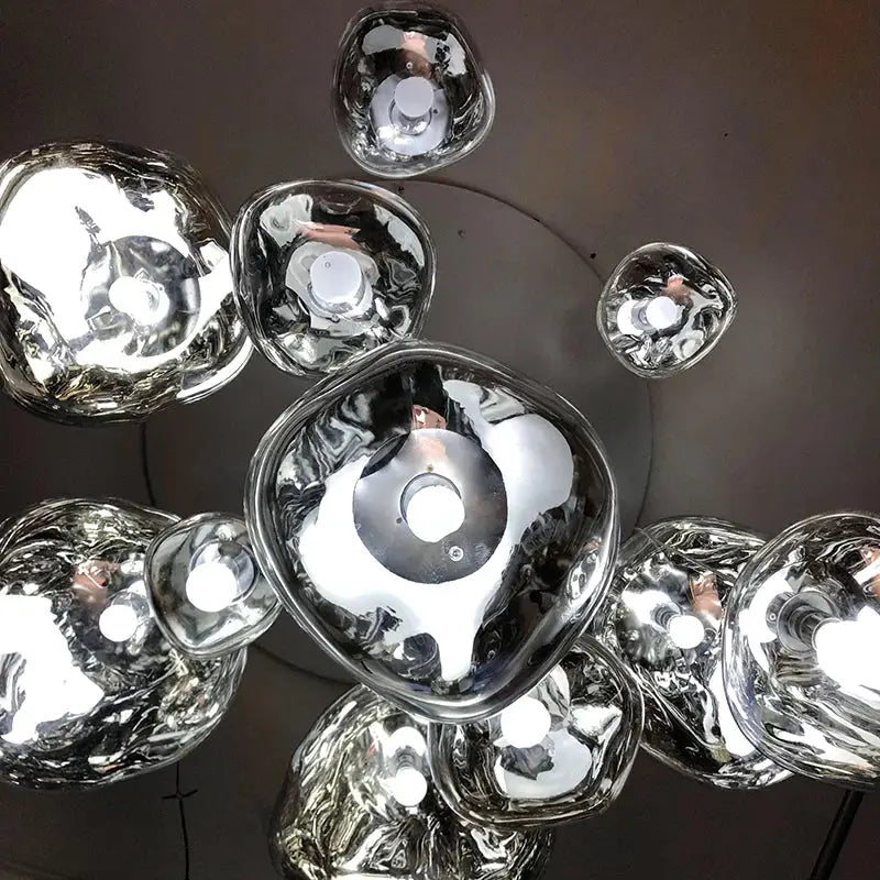 Silver reflective glass pendant lights with organic bubble shapes for modern metallic dining room cluster fixture