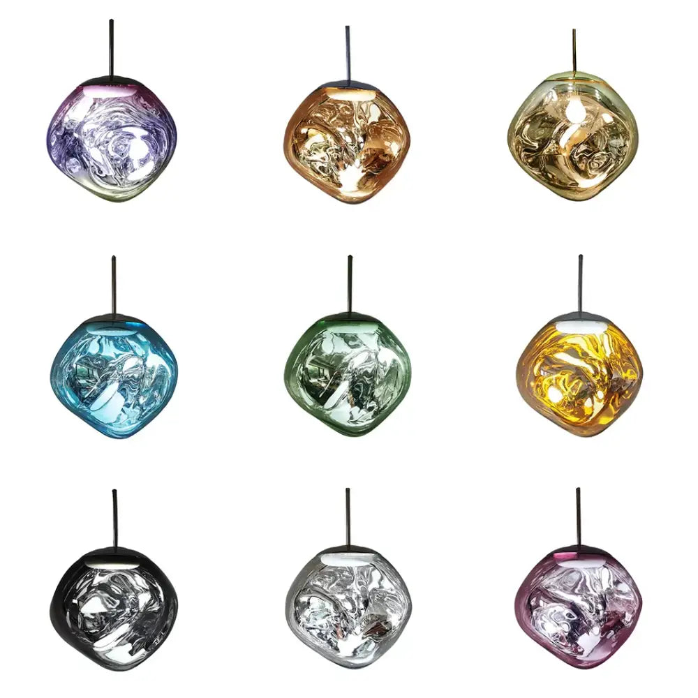 Modern metallic glass pendant lights featuring vibrant iridescent hues and swirling patterns for dining room clusters