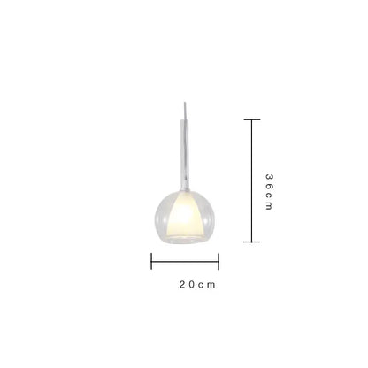 A sleek modern pendant light with a transparent glass globe and slender metallic stem decorbites designer glass chandelier