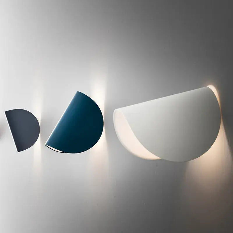 Three modern semi-circular ceramic wall lamps in dark gray teal blue and white for decorbites art decor rotating use