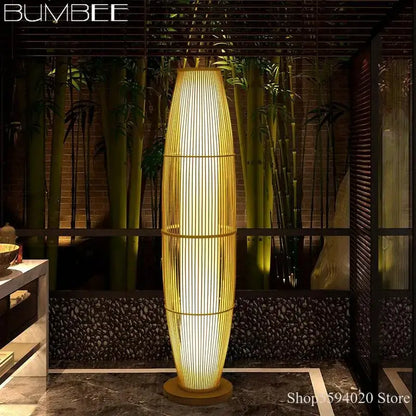 Modern minimalist golden bamboo floor lamp with sleek vertical design and warm ambient lighting for living room decorbites bamboo floor