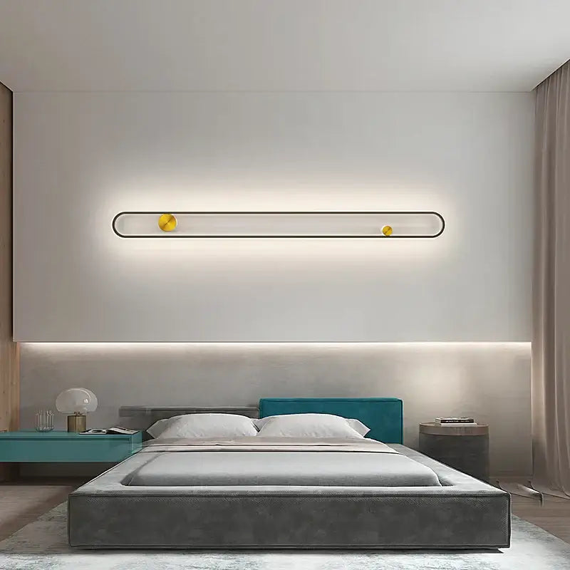 Modern minimalist black acrylic wall lamp with sleek frame and golden accents providing ambient decorbites led black lighting