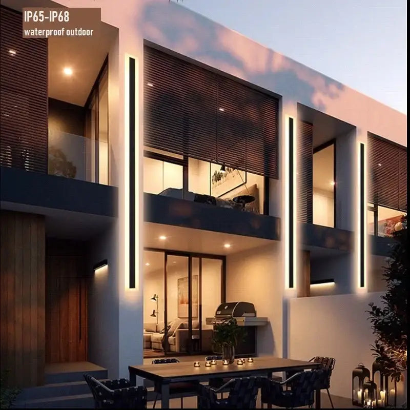 Modern minimalist black aluminum waterproof led outdoor wall lamp with vertical led light strips on a sleek two-story patio