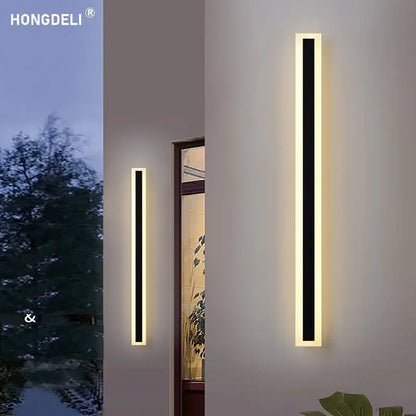 Modern minimalist black aluminum waterproof led wall lamp with sleek frames emitting warm ambient glow for outdoor use