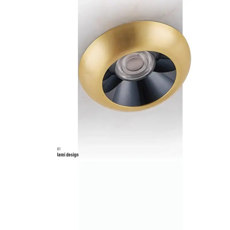 Gold-finished recessed ceiling light with black reflector complementing modern minimalist decorbites cloud stone pendant lamp