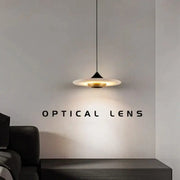 Modern minimalist black cloud stone pendant lamp with a sleek conical base and warm translucent shade by decorbites