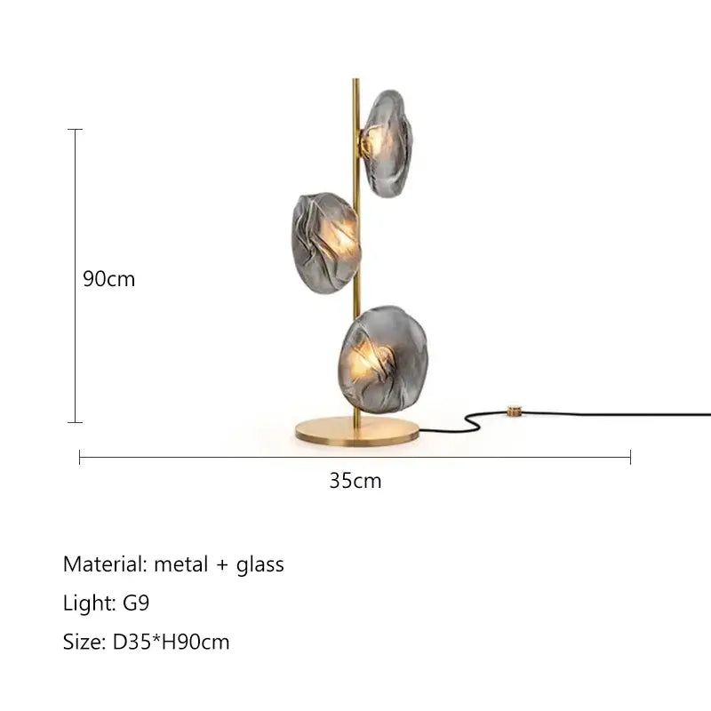 Modern minimalist floor lamp with brass base and three gray glass shade led lights for elegant home decor