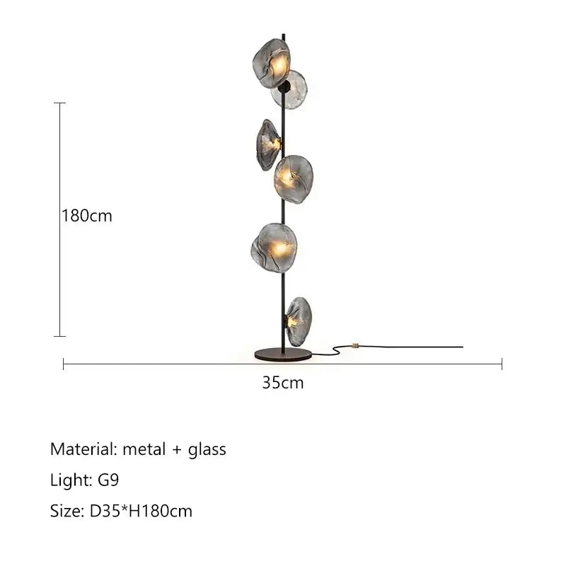Modern minimalist floor lamp with five translucent gray glass shade led globes on slender black metal pole for home decor