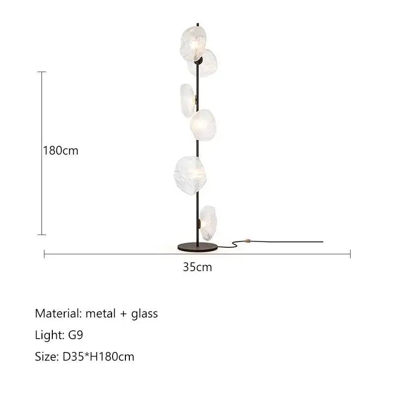 Modern minimalist black floor lamp with slender metal frame and five translucent glass shade led globes for home decor