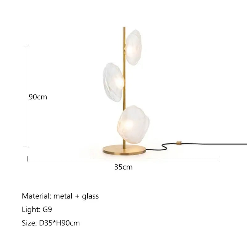 Modern minimalist floor lamp with slender gold metal frame and three translucent cloud-shaped glass shade led fixtures