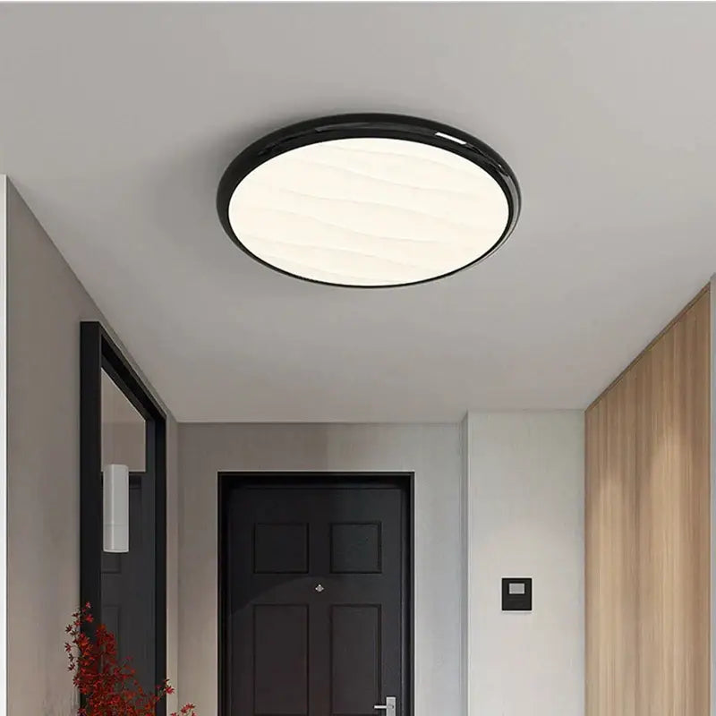 Modern minimalist black led ceiling light with sleek design and diffused white center for bedroom decorbites led ceiling
