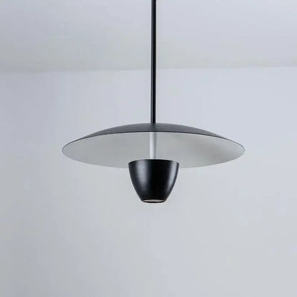 Modern minimalist black led pendant light with sleek disc-shaped shade and conical base for dining room decorbites black led hanging