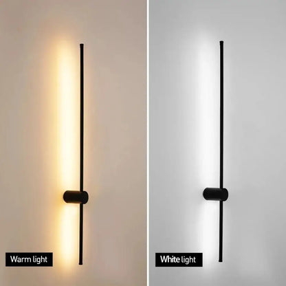 Black minimalist led strip wall lamp with sleek vertical rod and cylindrical base for modern staircase lighting decorbites led strip