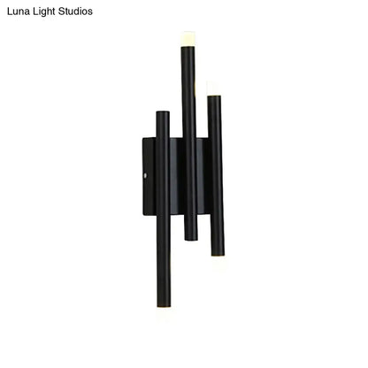 Modern minimalist black led wall lamp with three frosted glass arms offering versatile hallway light options