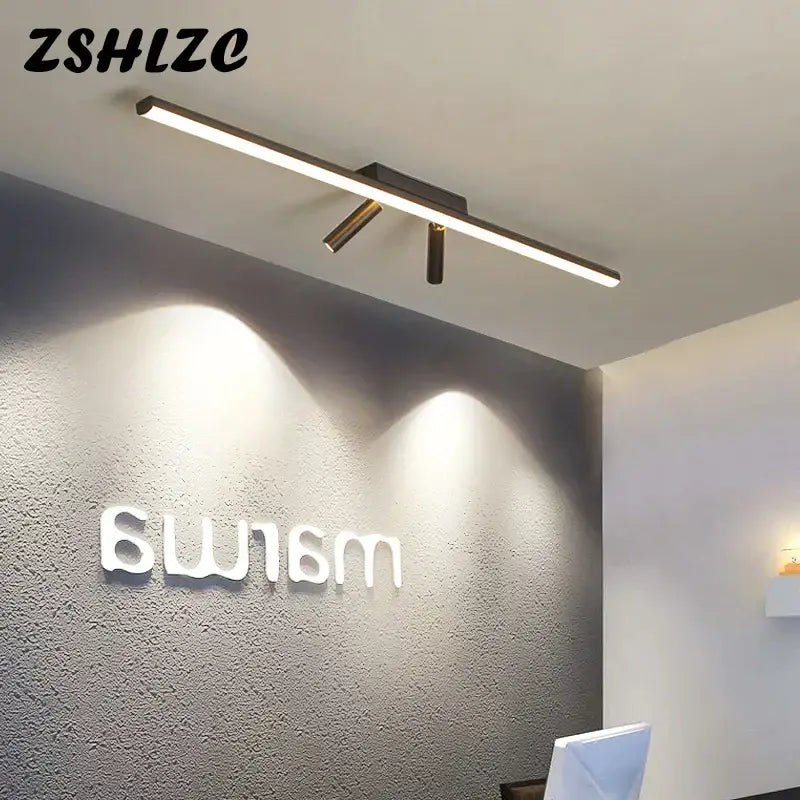 Modern minimalist black star ceiling light with sleek metallic finish and integrated spotlights for living room decorbites black star