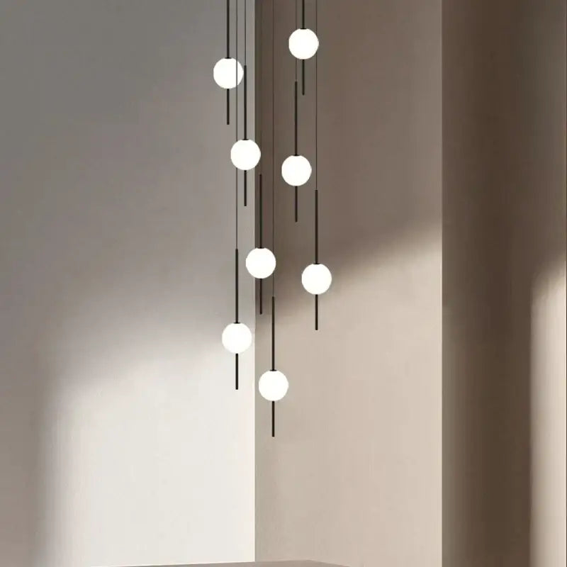 Modern minimalist black and white pendant light fixture with spherical bulbs by Decorbites creative led chandeliers